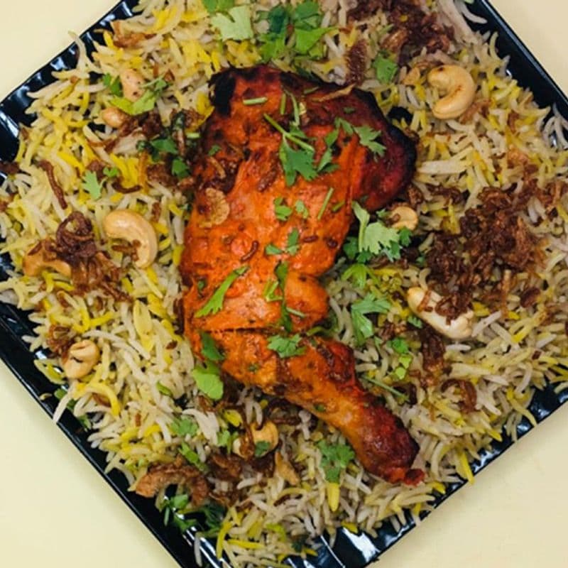 ١٦ قطعة دجاج مع الأرز